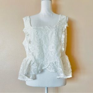 Arula White Floral Peplum Rosette Textured Sleeveless Smocked Cropped Blouse.